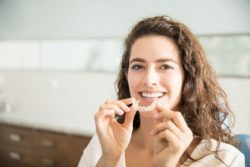 straightening smile with clear aligners