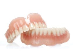 Dental implants and dentures can both restore your smile, but they may not always be interchangeable when it comes to treatment.